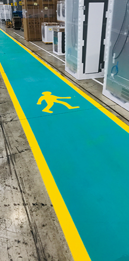 An after image of Locus carrying out factory floor painting to create a pedestrian walkway in a factory
