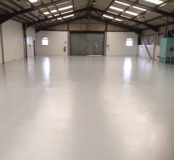 A freshly painted factory floor after Locus's factory floor painting services