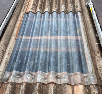 Close up of a commercial roof panel after skylight cleaning