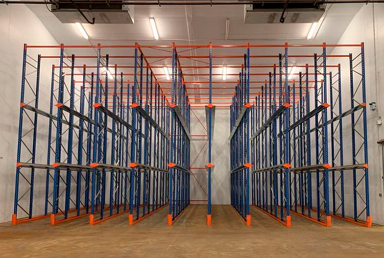 Organised blue warehouse storage, following warehouse cleaning by Locus Services